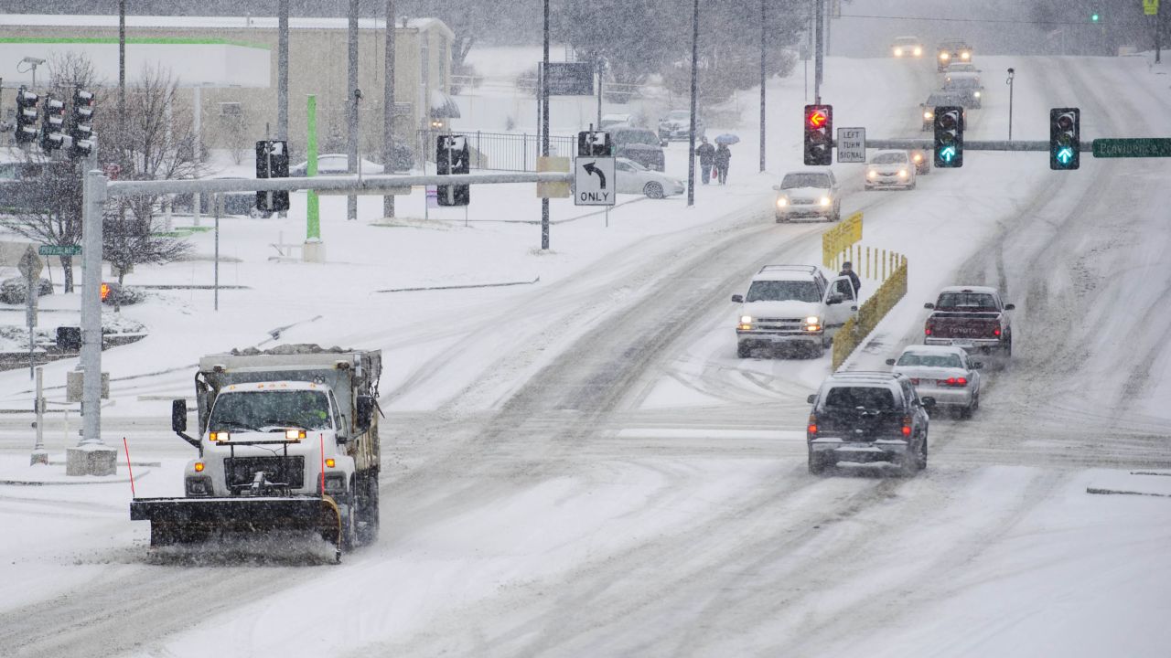 A salt truck clears a road in Columbia, Missouri, on February 4.