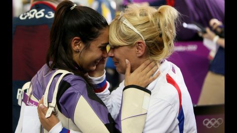 Serbian sport shooter Ivana Maksimovic, left, hugs her mother and coach, Miriban, after winning a silver medal at the London Games.