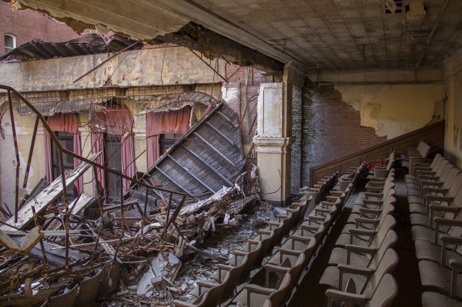 Located inside an abandoned apartment building in Baltimore that was later turned into a school, this <a >auditorium</a> was practically in shambles. Carolyn Kina visited in November. 