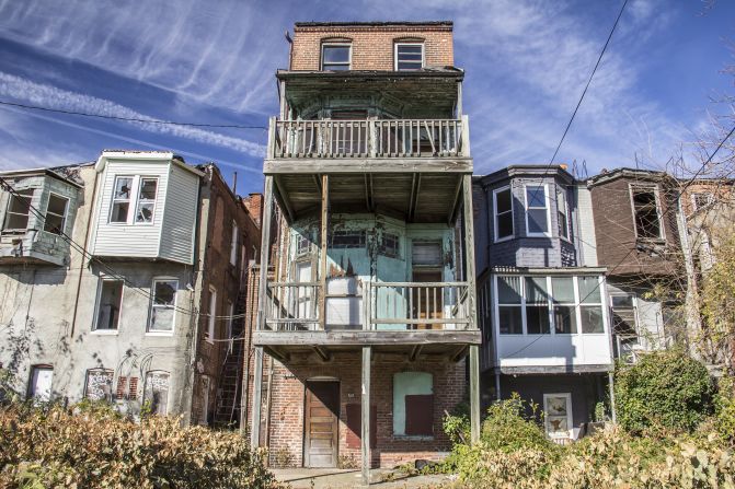After decades of population loss, Baltimore has thousands of vacant and blighted homes. The city plans to demolish some 1,500 row houses over the next few years to make way for redevelopment.