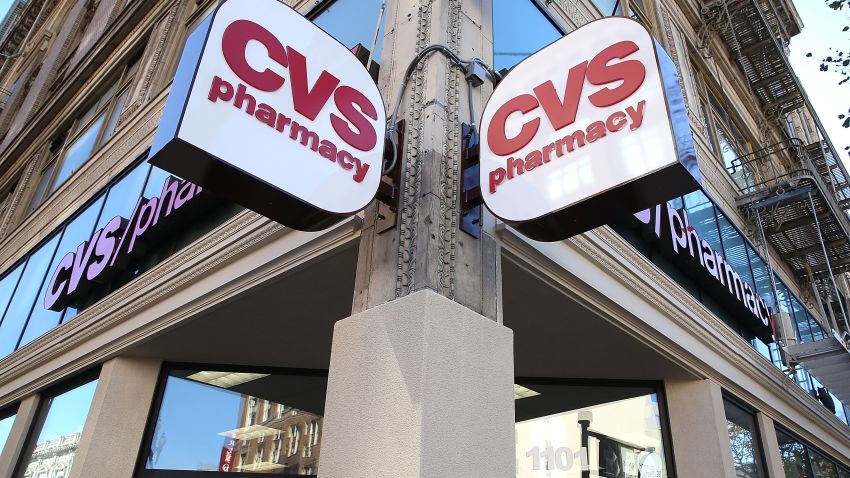 Signs are posted outside of a CVS store on November 5, 2013 in San Francisco, California. CVS Caremark reported a 25 percent surge in third-quarter earnings with profits of $1.25 billion, or $1.02 per share, compared to $1.01 billion, or 79 cents a share one year ago.