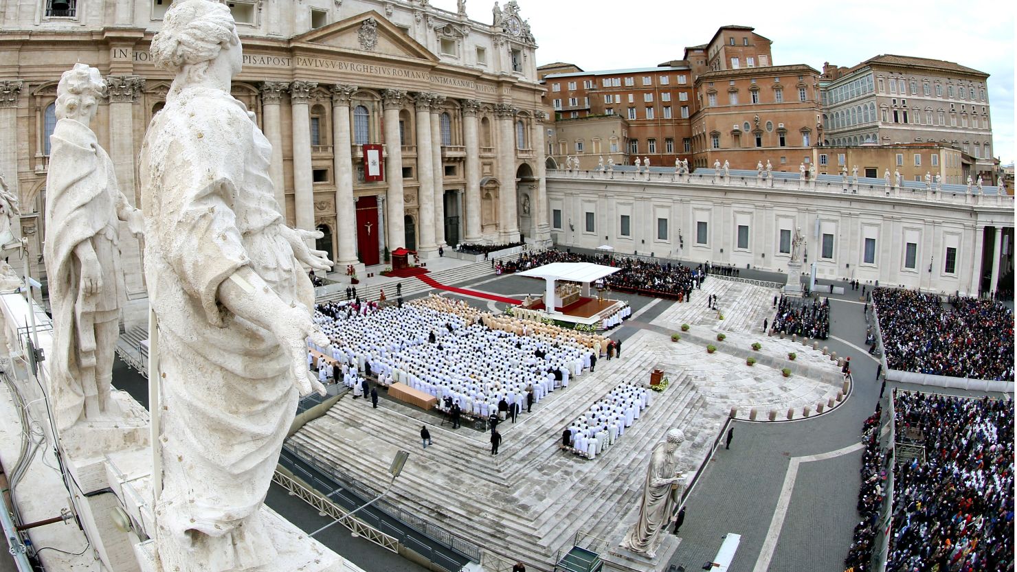 People gather during the end of the Solemnity of Christ the King in St. Peter's square on November 24, 2013 in Vatican City.