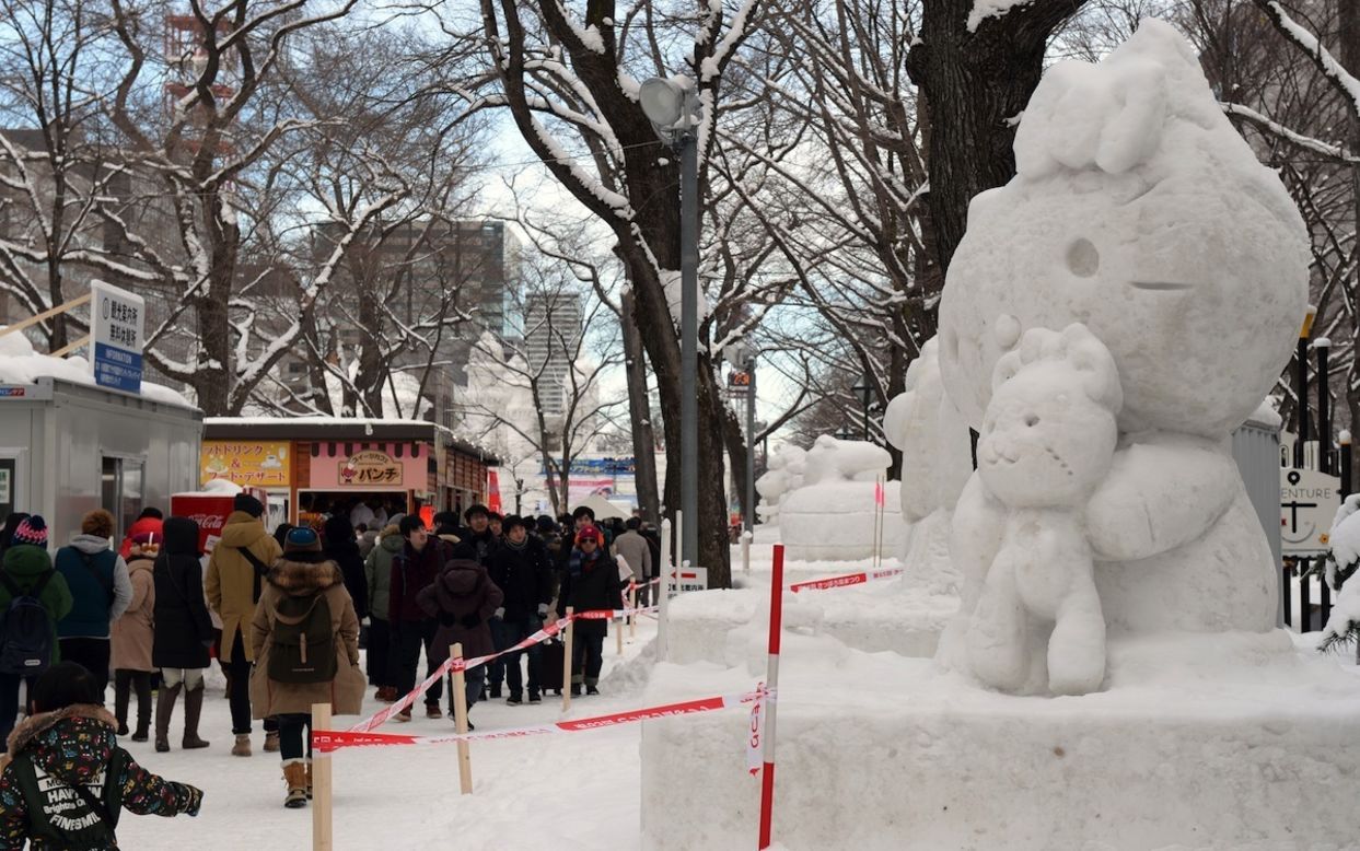 It wouldn't be a celebration without the world's favorite mouth-free cat. The <a href="http://travel.cnn.com/tags/hello-kitty">Hello Kitty</a> sculpture drew crowds on the opening day of the 65th annual Sapporo Snow Festival. 