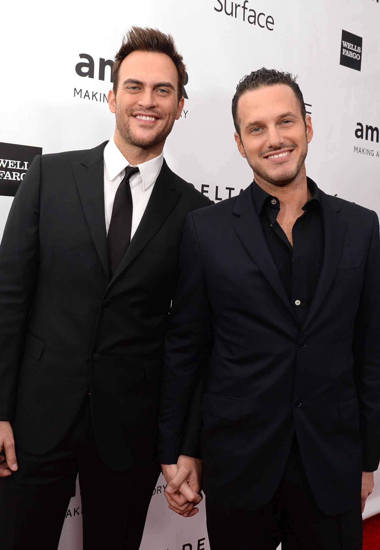 "Glee" actor Cheyenne Jackson, left, reportedly married actor Jason Landau on September 2014. <a href="http://www.people.com/article/cheyenne-jackson-marries-jason-landau" target="_blank" target="_blank">According to People</a>, the pair had an outdoor interfaith ceremony at a friend's estate in Encino, California.