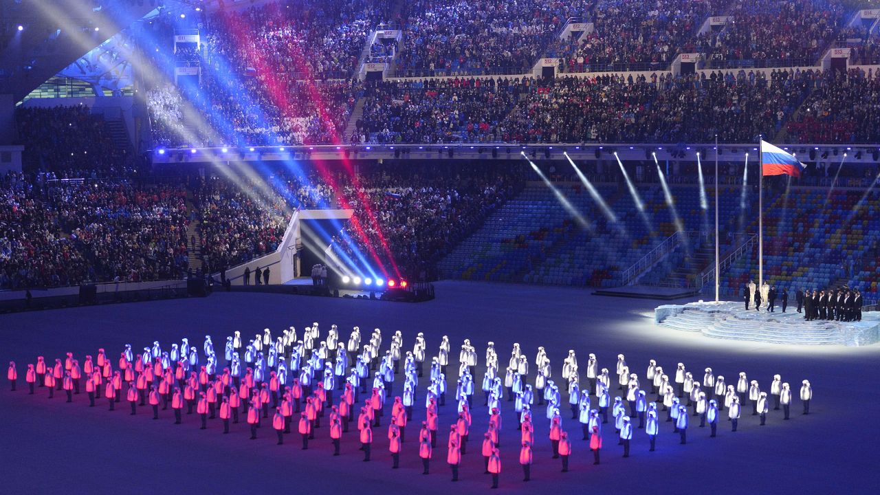 Performers' jackets light up to form the Russian flag.