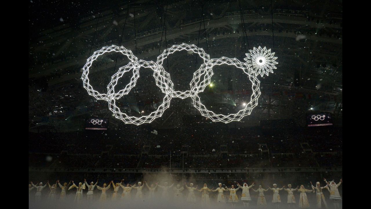 The Olympic rings are presented during the opening ceremony -- but there seemed to be a malfunction on the top right ring.