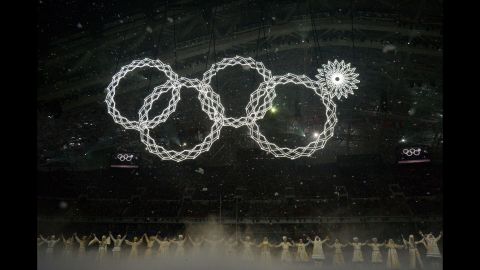 The Olympic rings are presented during the opening ceremony -- but there seemed to be a malfunction on the top right ring.