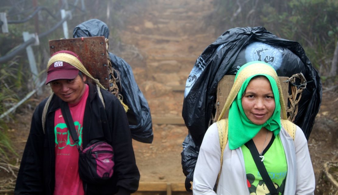 Porters earn 128 Malaysian Ringgit ($40) for two days' work on Mount Kinabalu. 