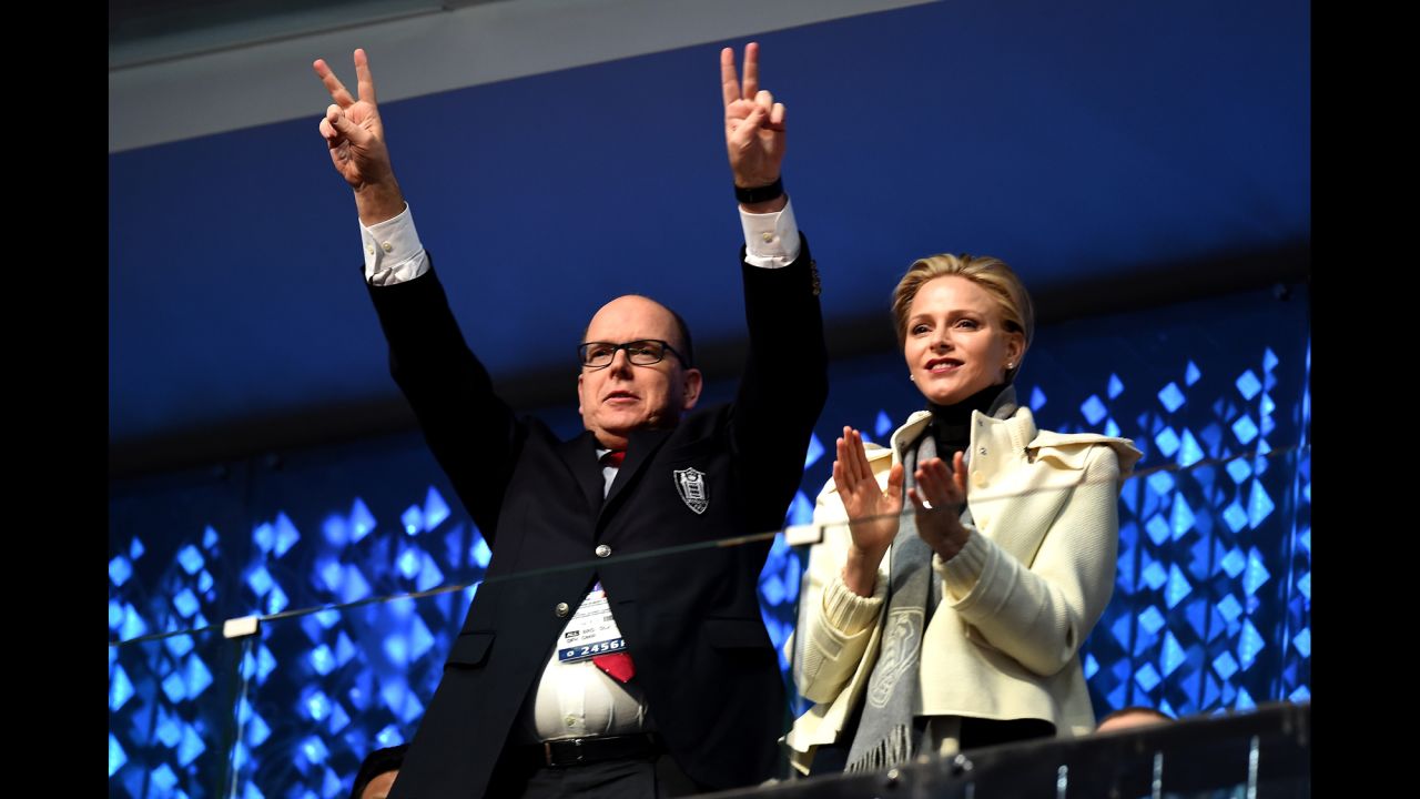Prince Albert II and Princess Charlene of Monaco enjoy the atmosphere.
