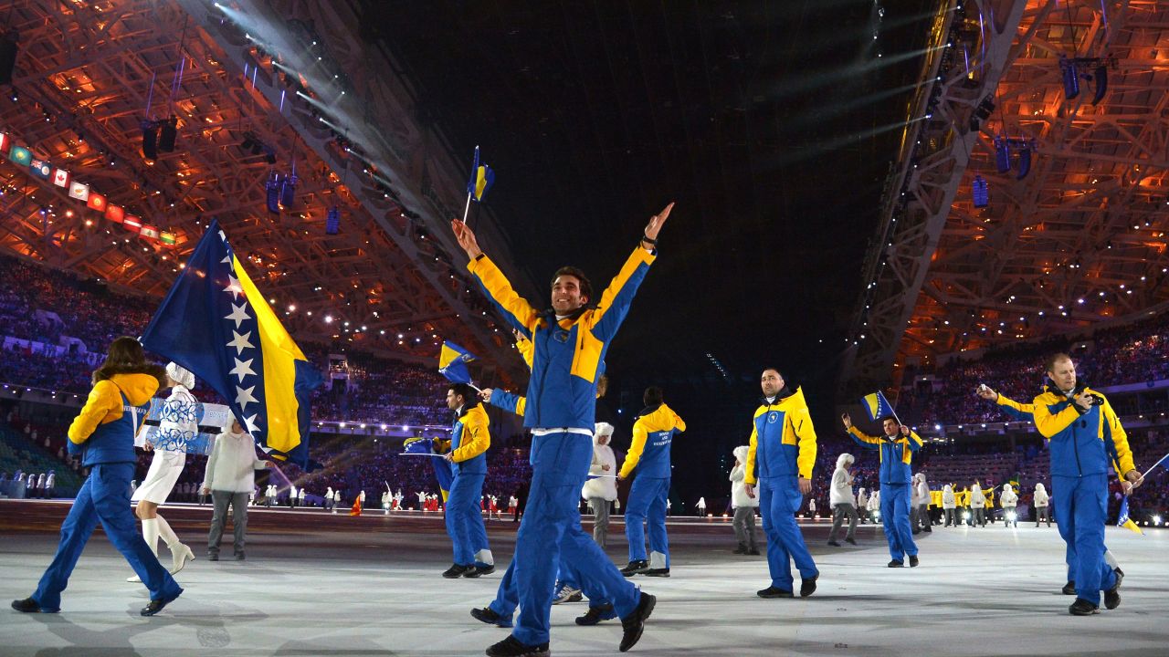 Members of the Bosnia and Herzegovina delegation enter the stadium.