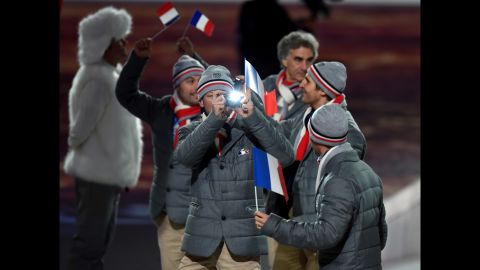 French Olympians take pictures.