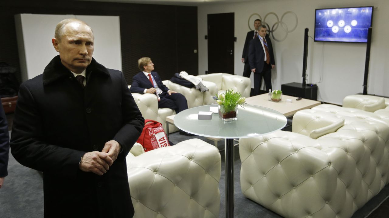 Putin waits to be introduced at the ceremony.