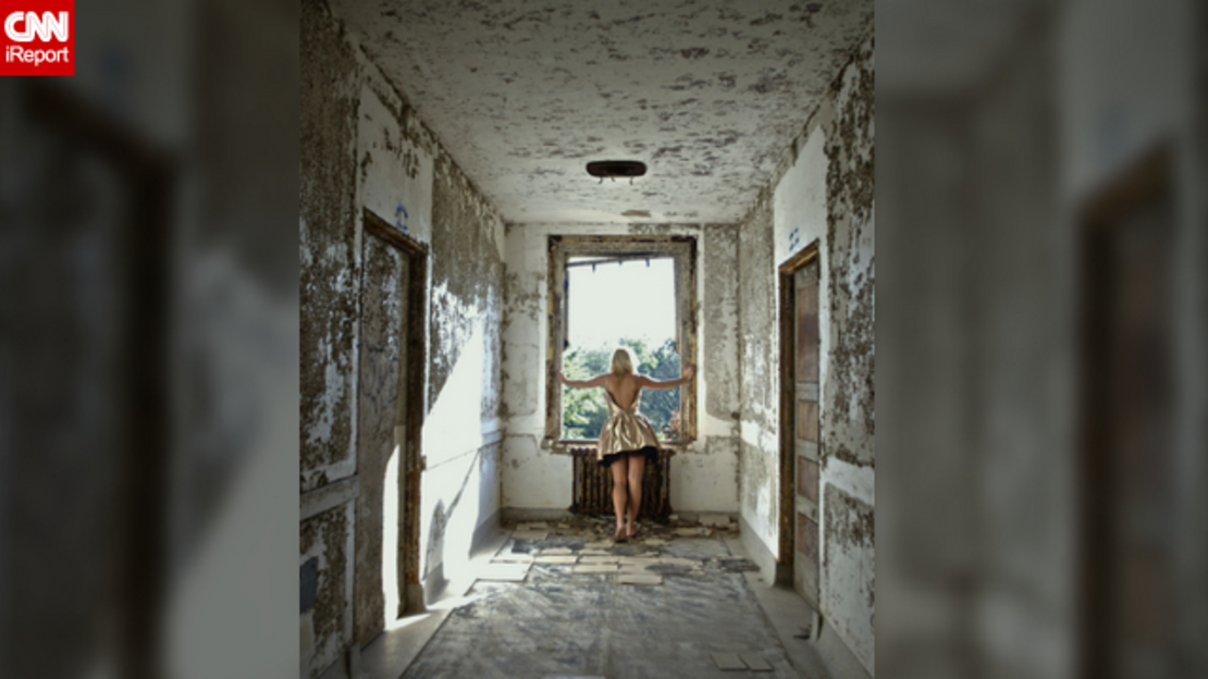 Carolyn Kina poses in an abandoned hospital in Maryland. - (Courtesy Carolyn Kina)