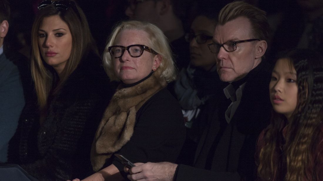 Daisy Fuentes and Neiman Marcus fashion director Ken Downing sit front row at Carmen Marc Valvo's show. Other celebrities in attendance were Katie Couric and Vanessa Williams.