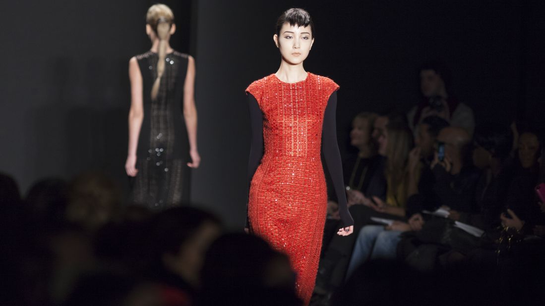 However, Carmen Marc Valvo still stayed true to his glamorous roots as seen in this red-orange sheath dress.
