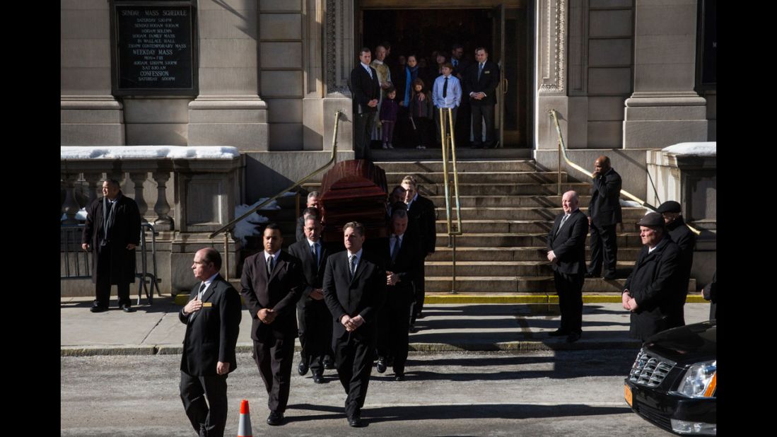 The casket carrying Oscar-winning actor Philip Seymour Hoffman leaves the Church of St. Ignatius Loyola after Hoffman's private funeral service Friday, February 7, in New York City. Hoffman, 46, was found dead in his Manhattan apartment February 1.