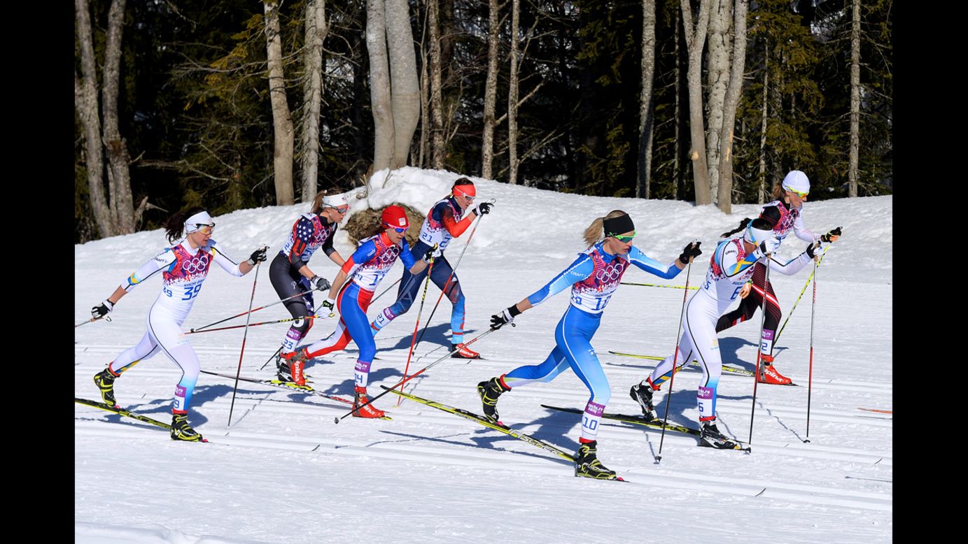 Cross-country skiers compete in the women's skiathlon.