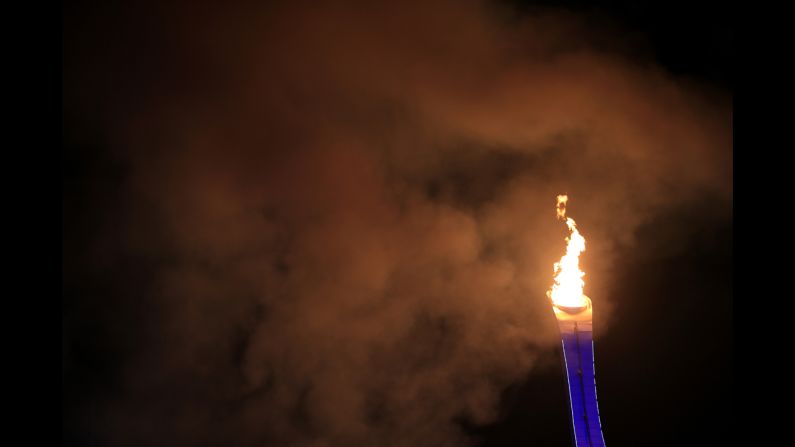 The Olympic cauldron is lit during the opening ceremony.