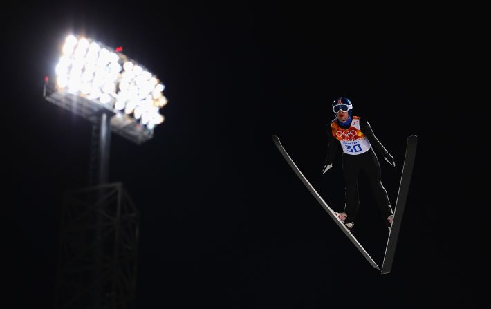 Anders Jacobsen of Norway jumps during qualification for the men's normal hill ski jumping event.