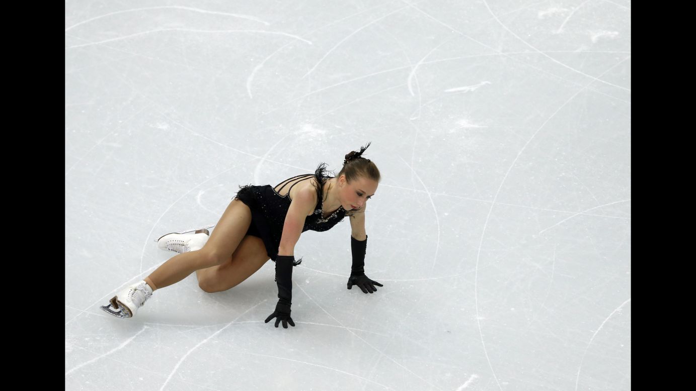 Germany's Nathalie Weinzierl takes a fall during the team figure skating event.