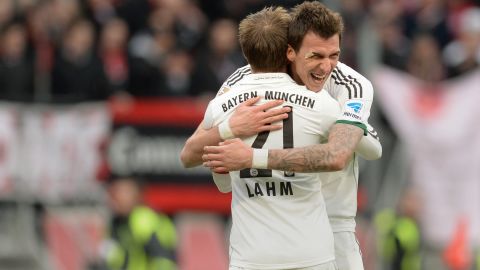 Croatian striker Mario Mandzukic (right) embraces Philipp Lahm after the German defender scored in the 2-0 win a Nuremburg.