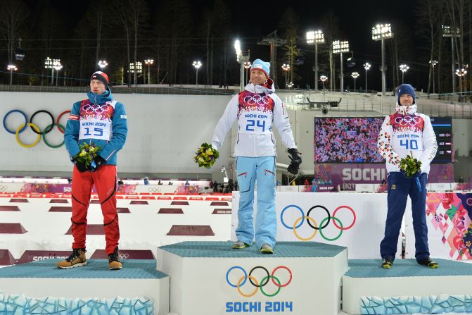 (From left to right) Silver medalist Austria's Dominik Landertinger, Gold medalist Norway's Ole Einar Bjoerndalen, and Bronze medalist Czech Republic's Jaroslav Soukup. Norway are top of the medal table after day one with two golds, one silver and one bronze.