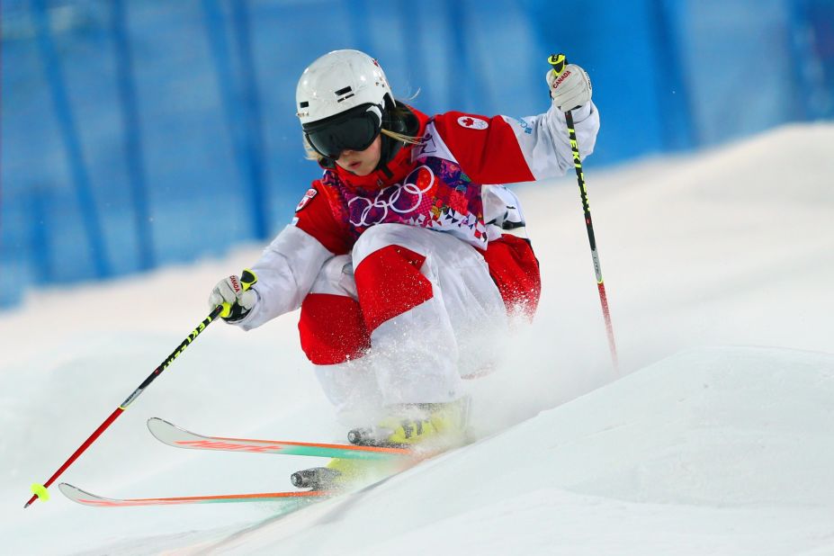Canada's Justine Dufour-Lapointe rides the bumps on the mogul course at Sochi's Rosa Khutor Extreme Park. The 19-year-old took gold, pipping her older sister Chloe to the Olympic women's moguls title. 