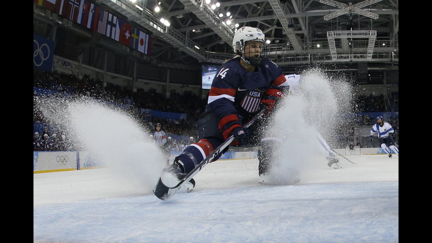 Brianna Decker of the United States fights for the puck during a Group A match between the U.S. and Finland on February 8. 