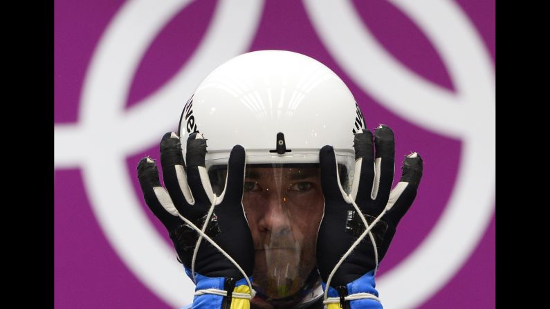 Ukraine's Andriy Kis prepares for his second run in the luge on February 8. 