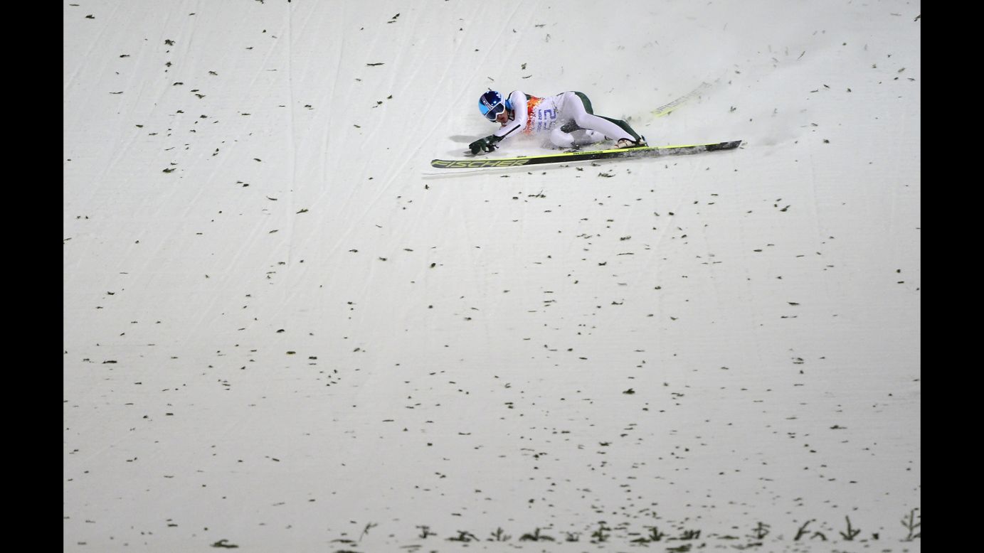 Slovenia's Robert Kranjec falls while competing in the men's normal hill ski jumping event on February 8. 