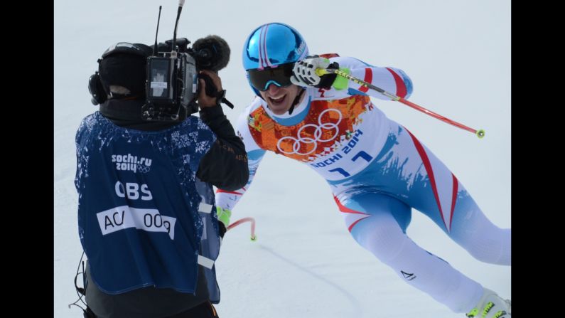 Austria's Matthias Mayer reacts in the finish area during the men's downhill. He won the gold medal.
