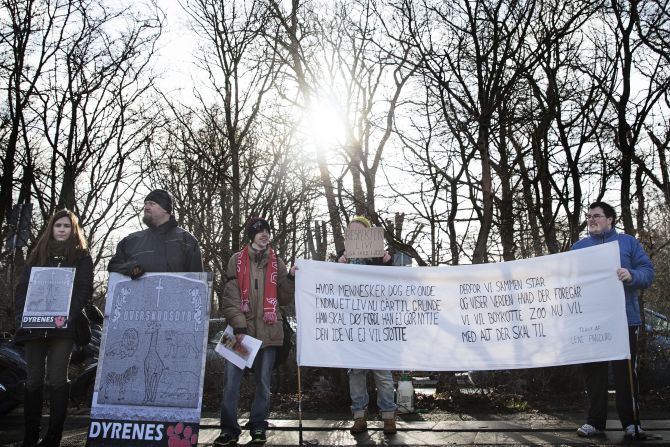 Protestors demonstrate outside the Copenhagen Zoo against the killing of the giraffe on February 9. 