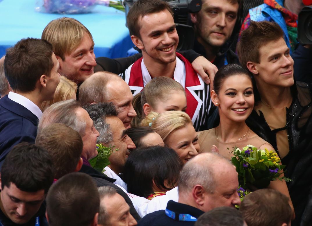 Russia's gold medalists in the team figure skating were congratulated after their triumph by President Vladimir Putin.