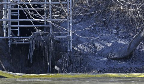 A pipe from the Dan River power plant where coal ash spilled is seen along the Dan River on February 5. 