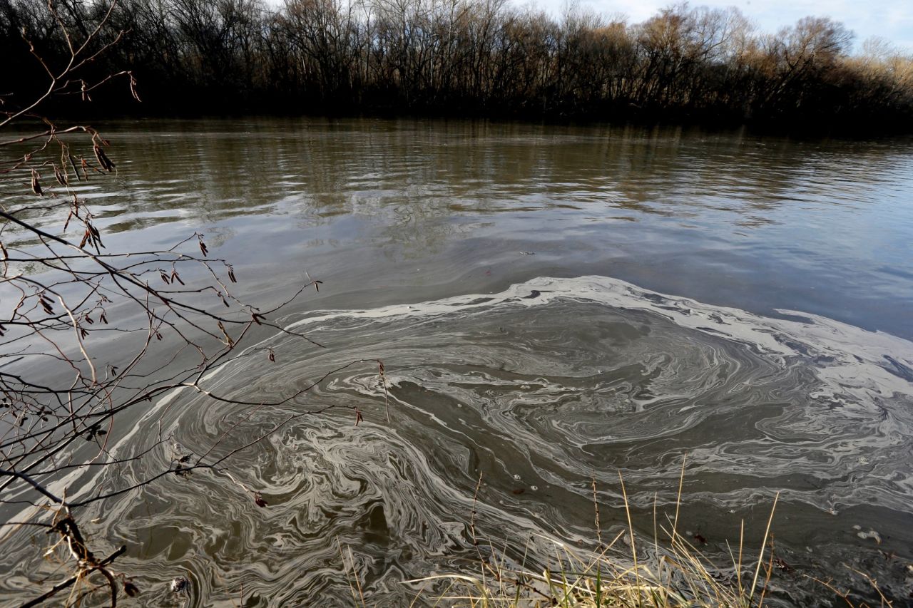 Coal ash residue swirls in the water of the Dan River near Danville, Virginia, on February 5.