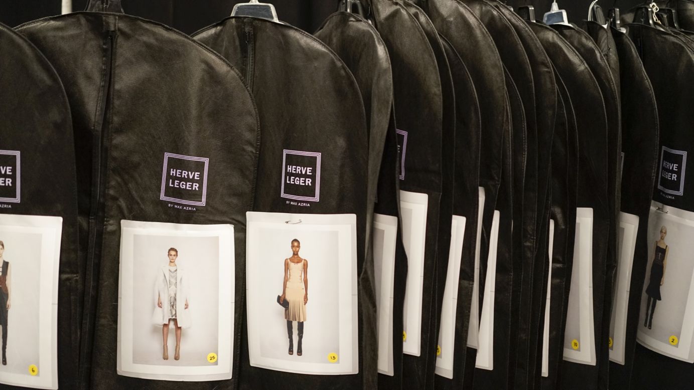 Garment bags for each Herve Leger model are organized in order of appearance on the runway.