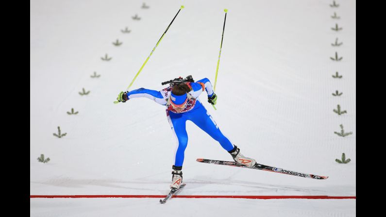 Biathlete Dorothea Wierer of Italy crosses the finish line in the women's 7.5-kilometer sprint on February 9. 