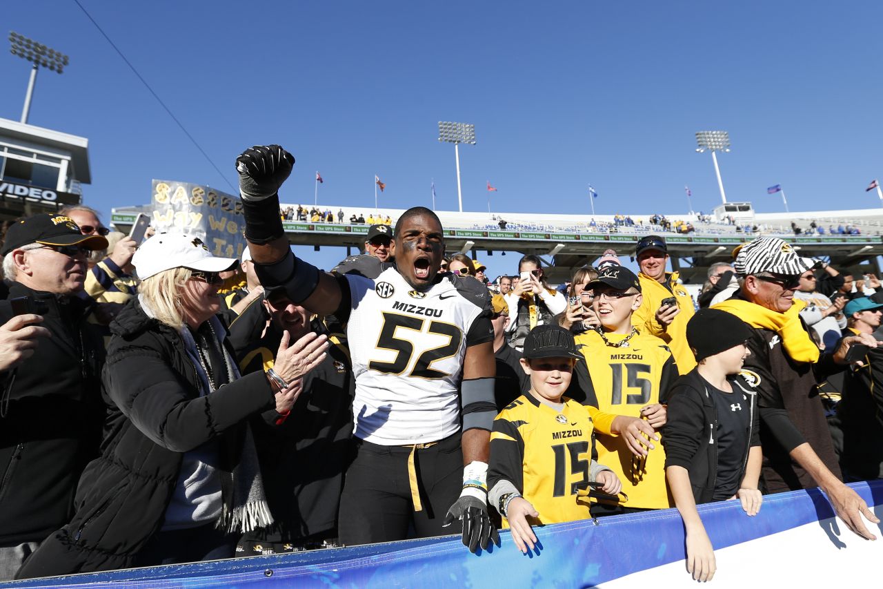 Sam celebrates with fans November 9, 2013, after Missouri defeated the Kentucky Wildcats in Lexington, Kentucky.