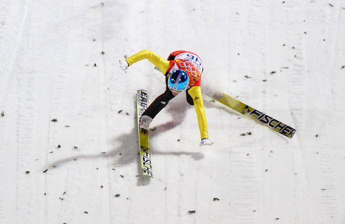 Severin Freund of Germany crashes upon landing during the first round of the men's normal hill ski jumping event on Sunday, February 9.