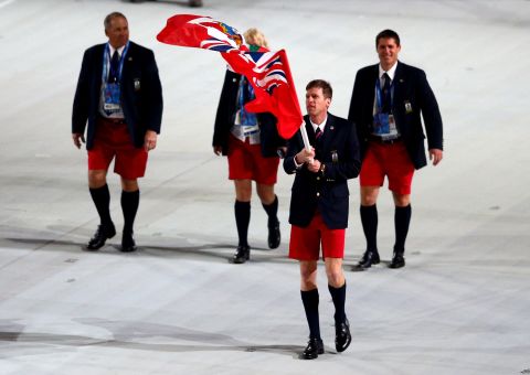 Bermuda's sole athlete and flag-bearer is Tucker Murphy, a skier, seen proudly wearing Bermuda shorts at the Games' opening ceremony.