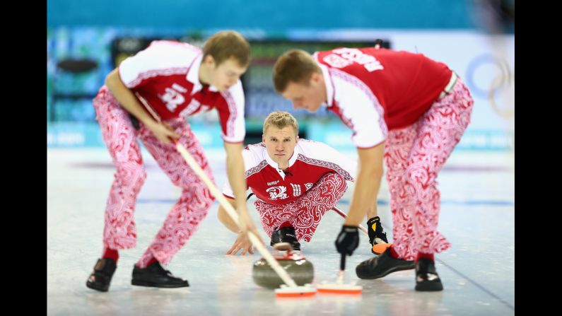 Russian curlers focus during a match against Great Britain on February 10.