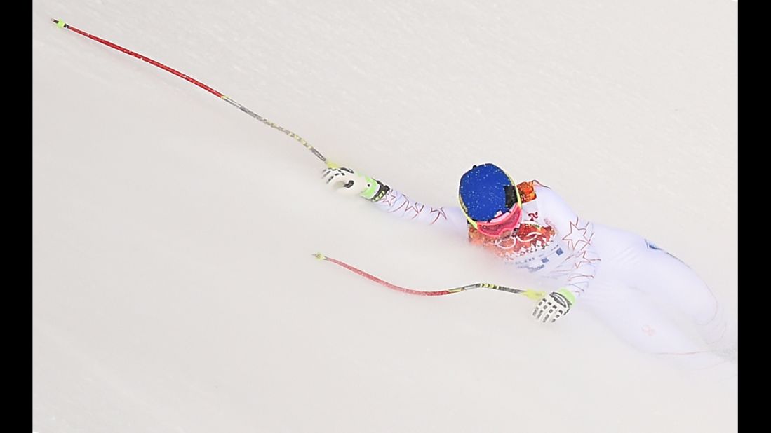 U.S. skier Laurenne Ross falls during the downhill portion of the super-combined event on February 10.