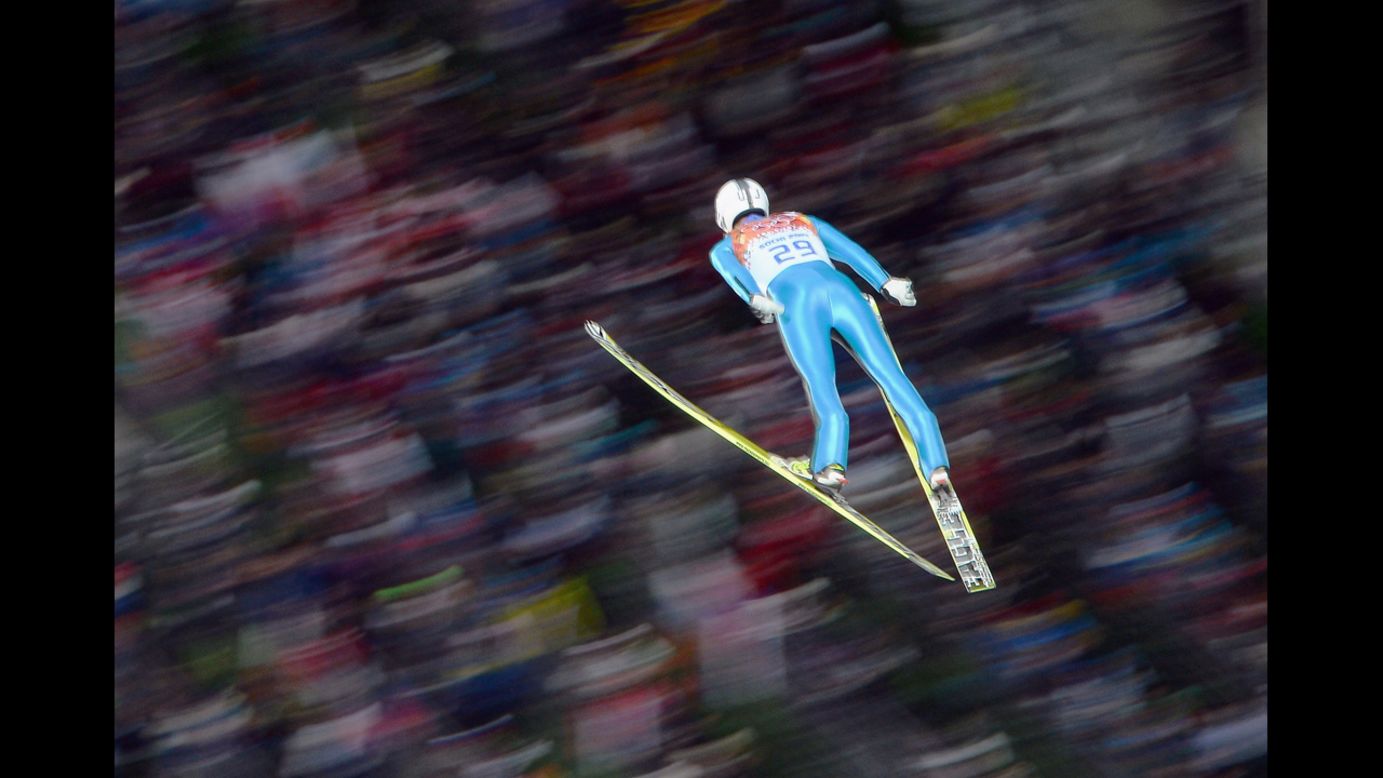 Janne Ahonen of Finland flies in the air during the men's normal hill ski jumping event on Sunday, February 9.