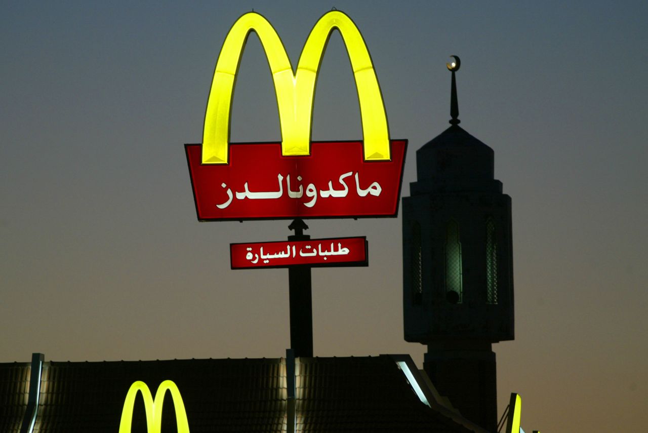 A McDonald's sign in front of a minaret in Kuwait City. The fast food giant has managed to succeed in many Gulf states, including Kuwait, Saudi Arabia and the UAE.