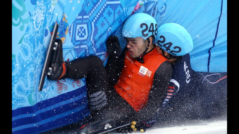 Sjinkie Knegt of Netherlands and Se Young Park of South Korea compete in a 1,500-meter short track speedskating race on February 10.