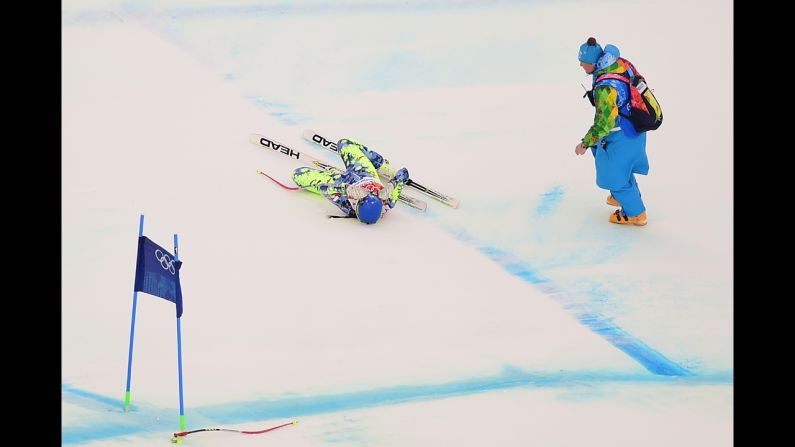 Chilean skier Noelle Barahona lies on the snow after she fell during the downhill portion of the super-combined event on February 10.