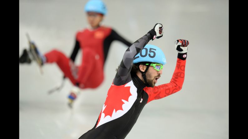 Canada's Charles Hamelin celebrates after winning the 1,500-meter final on February 10.