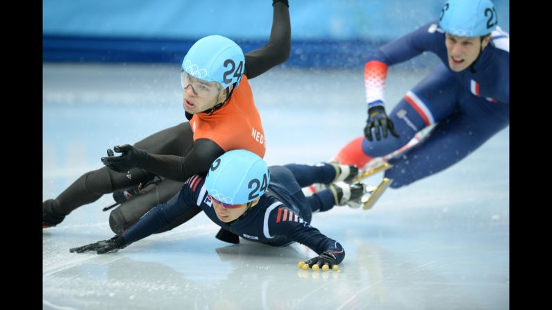 Dutch speedskater Sjinkie Knegt, left clashes with South Korea's Park Se Yeong in the men's 1,500-meter short track race.