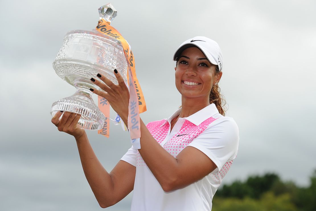 Cheyenne Woods hold the Australian Ladies Masters trophy aloft in 2014.