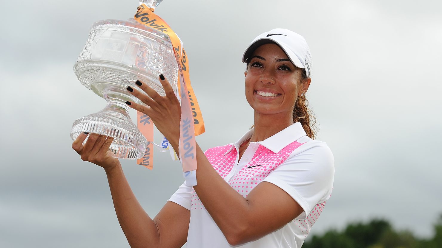 Cheyenne Woods hold the Australian Ladies Masters trophy aloft following her victory on Queensland's Gold Coast on Sunday.